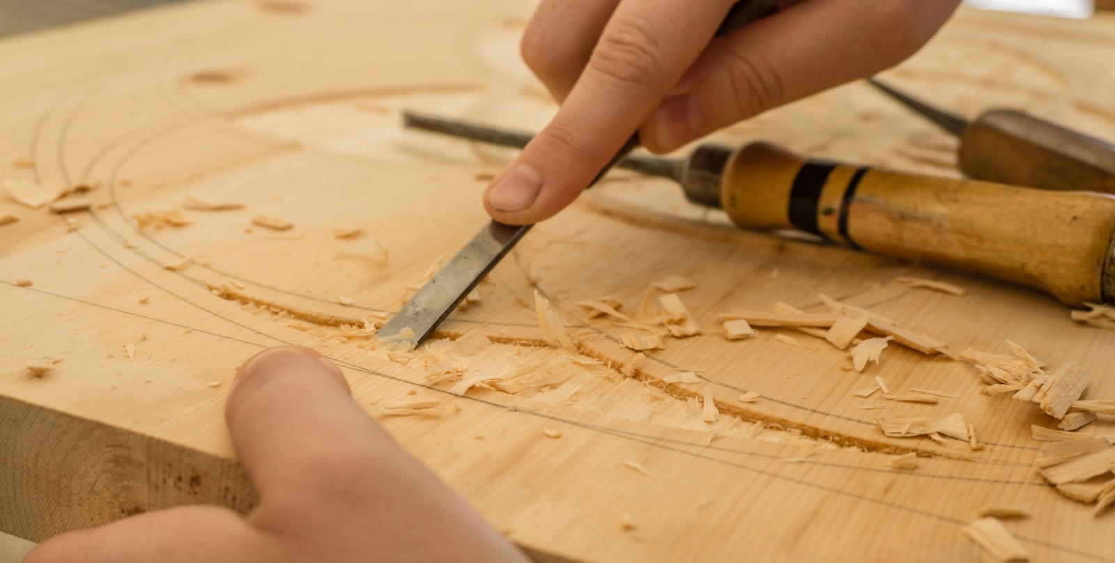 A carpenter working in a woodshop